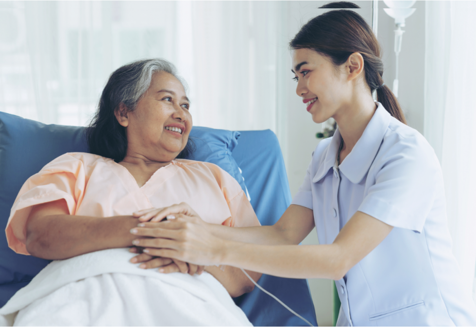 Nurse interacting with a resident in a care setting.
