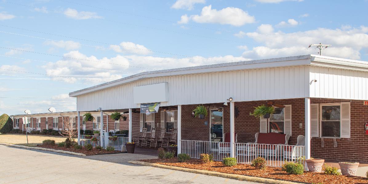 View of the facility's exterior with seating