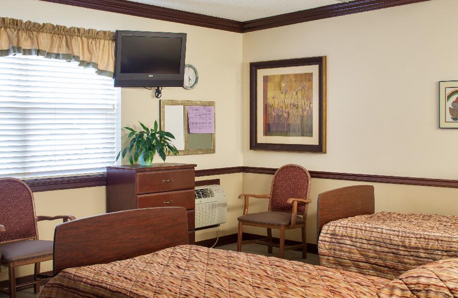 Interior view of a shared resident room with two beds