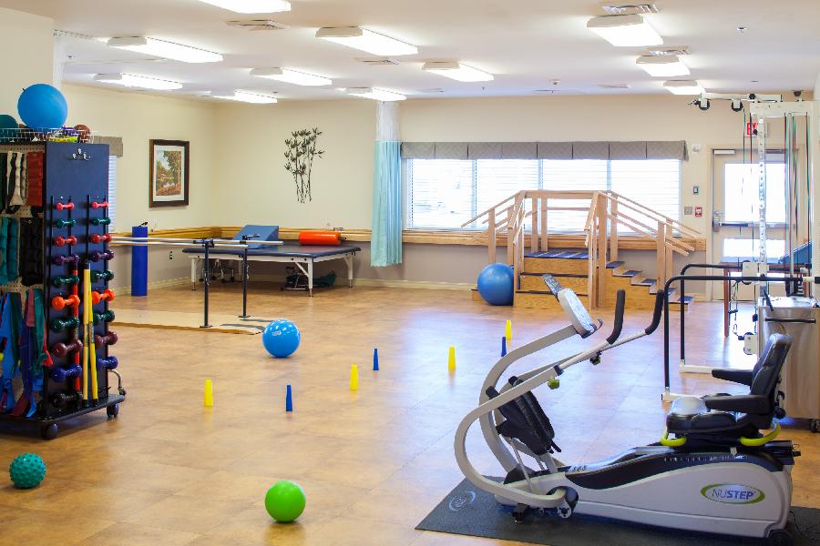 Interior view of a fitness area with exercise equipment