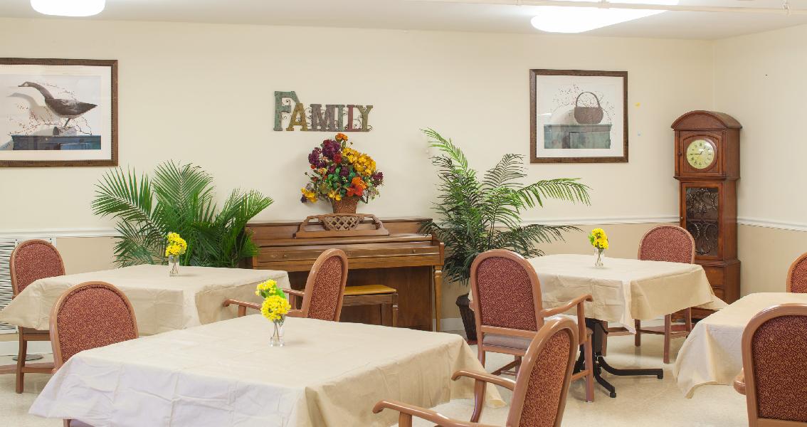 Bright common area with tables and decorations