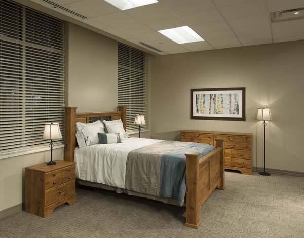 A well-furnished bedroom in a senior living facility