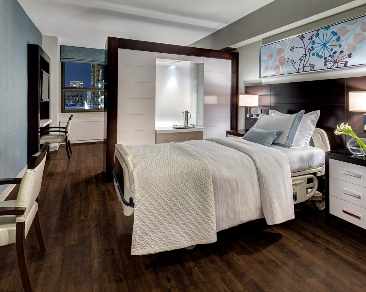 Private resident room with a bed and amenities