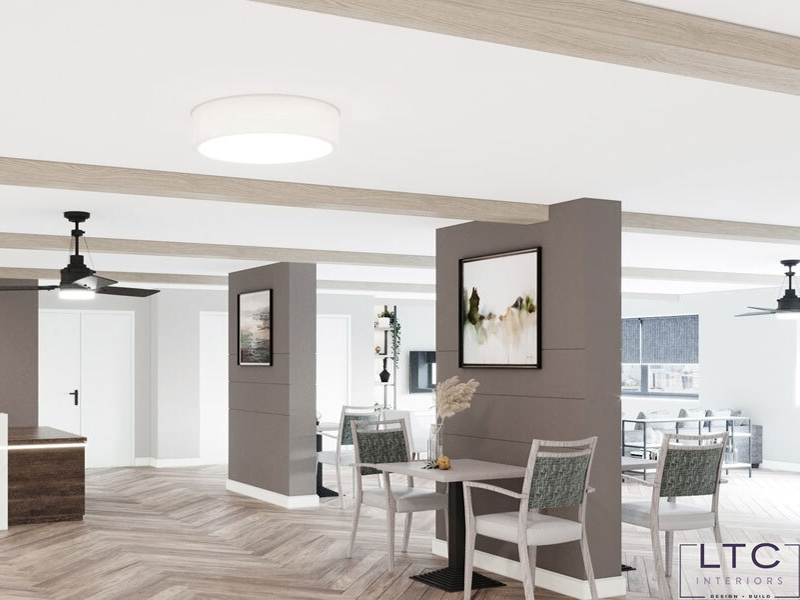 Bright common area with seating and decorative art