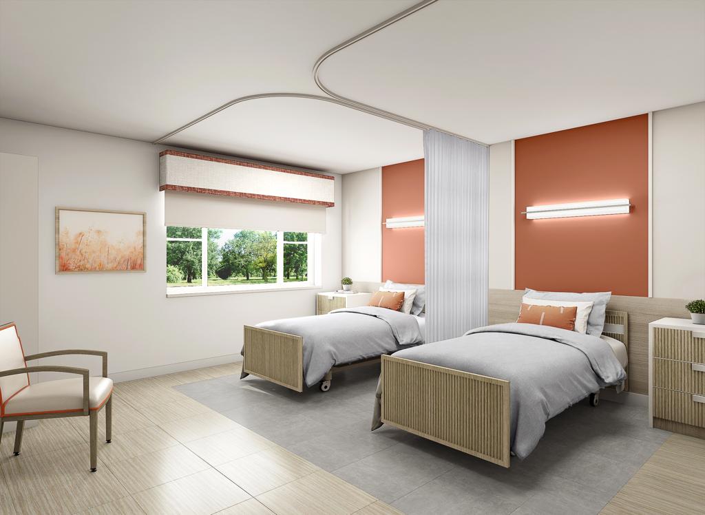 A bright resident room with two beds and a view
