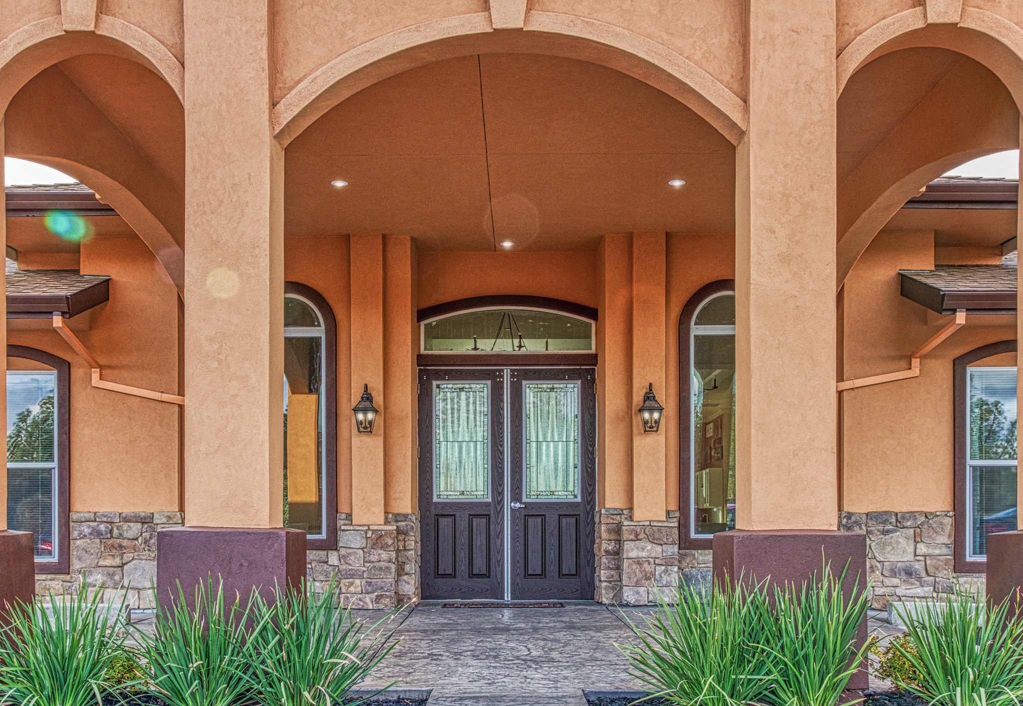 Exterior view of the facility entrance with decorative features