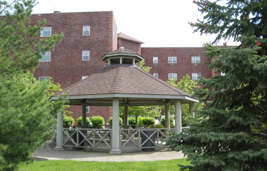 Gazebo in a landscaped outdoor area of the facility