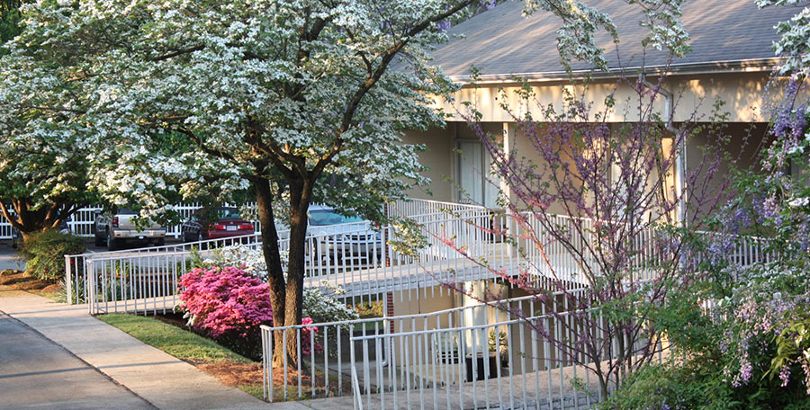 Exterior view of a nursing facility with landscaping