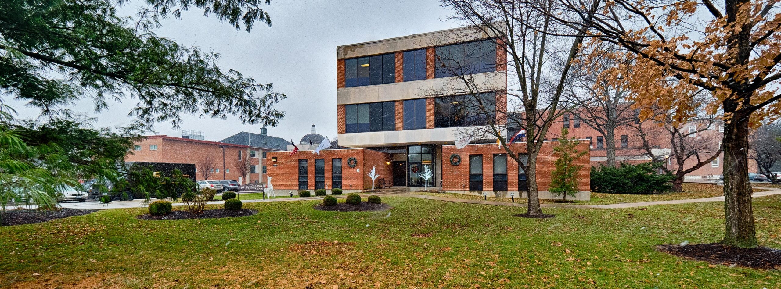 Exterior view of Abbey Senior Health building on a rainy day