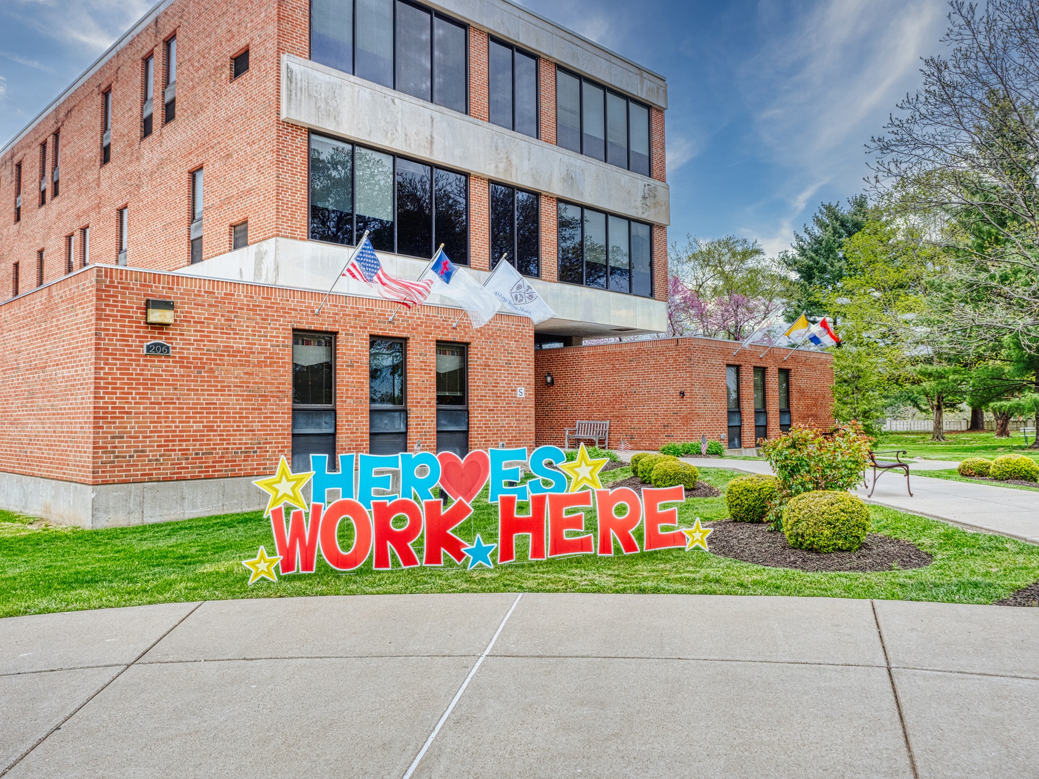 Exterior view of the facility with a colorful sign
