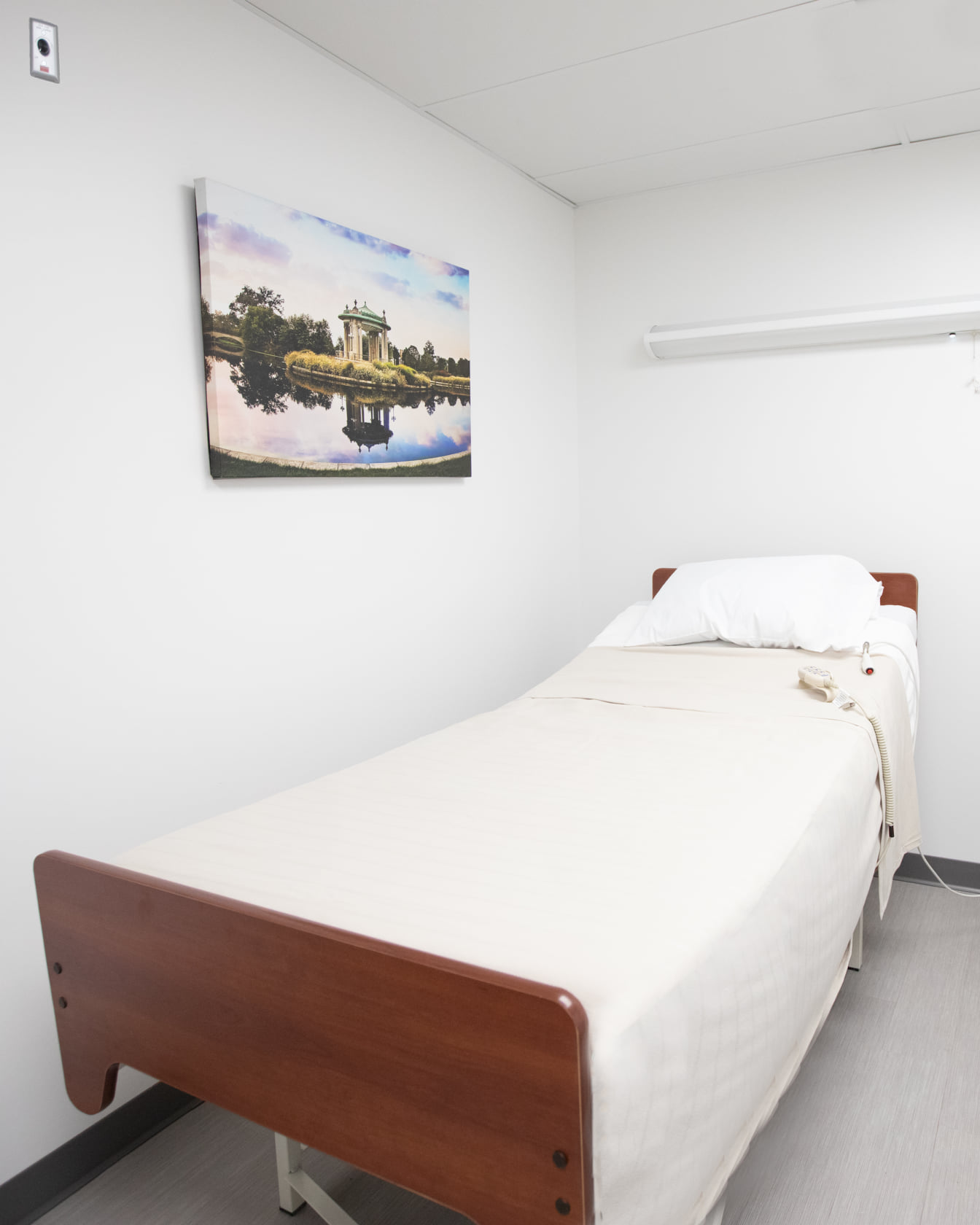 A private resident room with a bed and decor