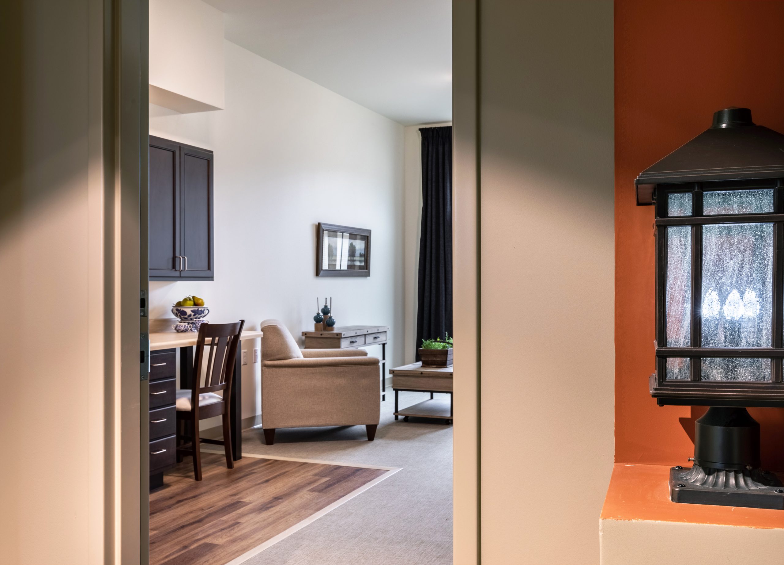 View into a well-furnished resident room