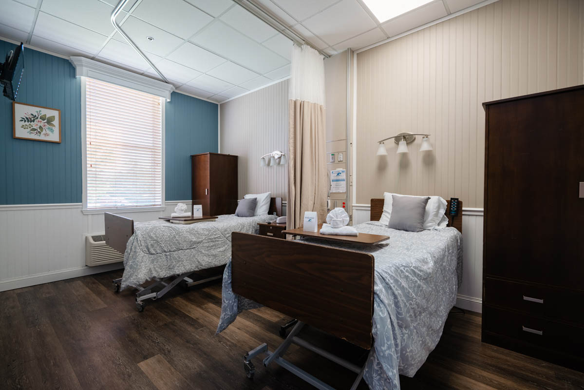 Two twin beds in a shared resident room