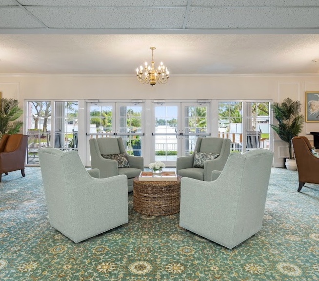 Bright common area with seating and natural light