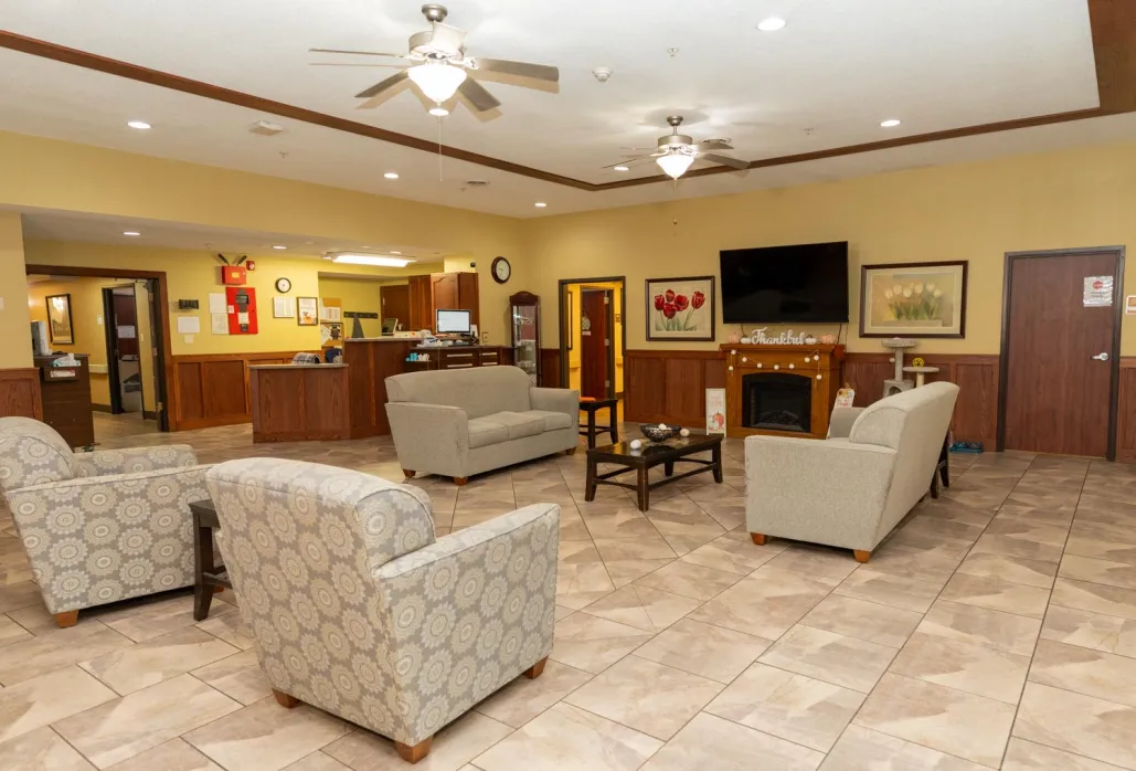 Common area with comfortable seating and a fireplace