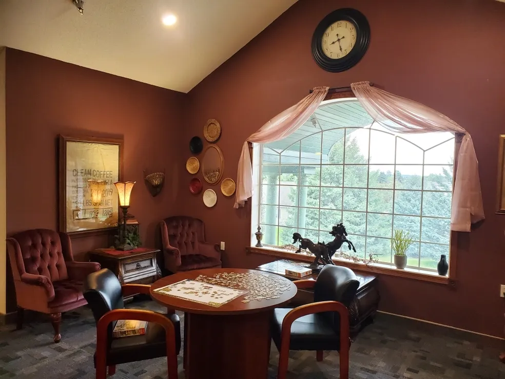 Cozy common area with seating and natural light