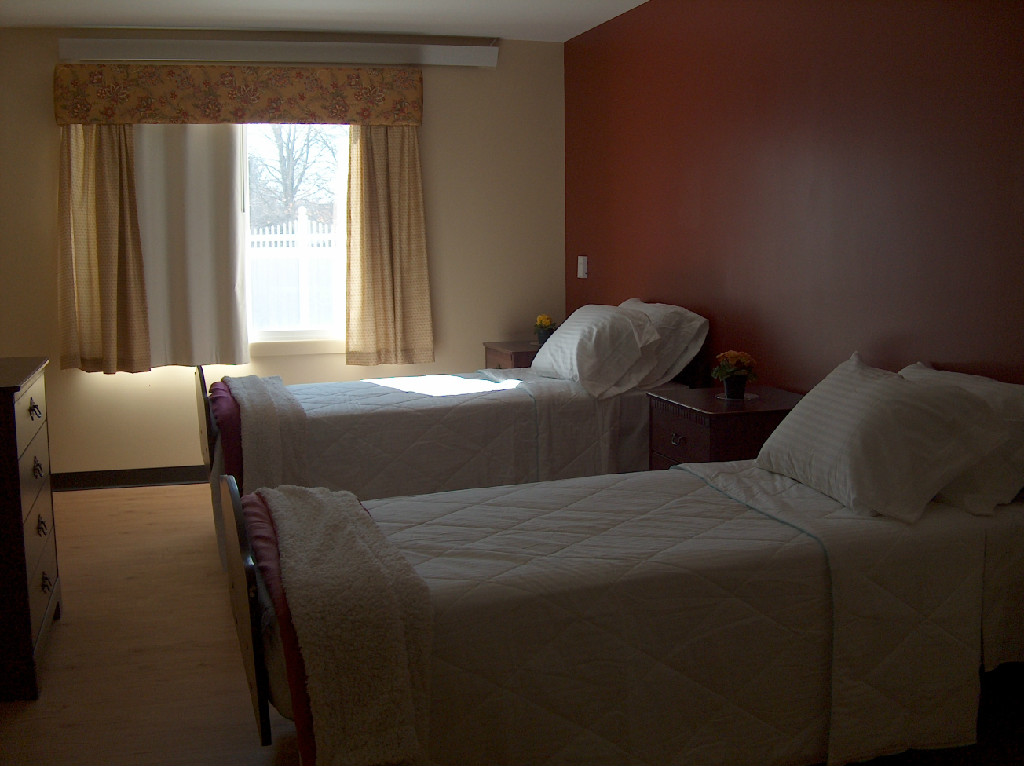 Bright interior of a twin bedroom in the facility