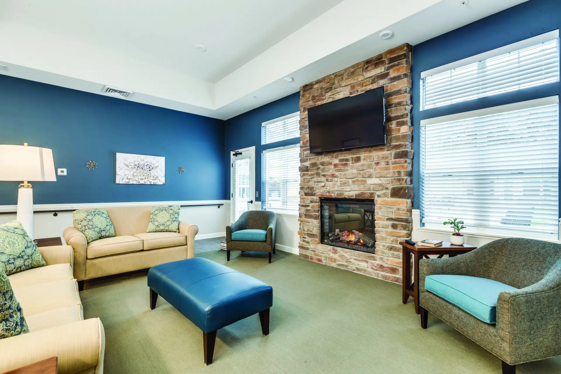 Cozy common area with seating and fireplace