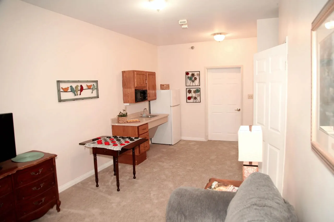 Interior view of a resident room with kitchenette
