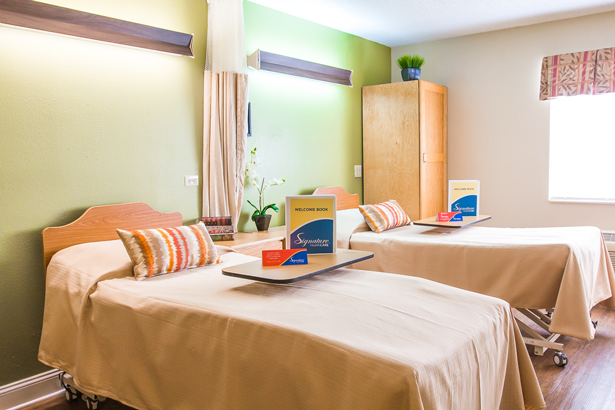 Interior view of a shared resident room with two beds