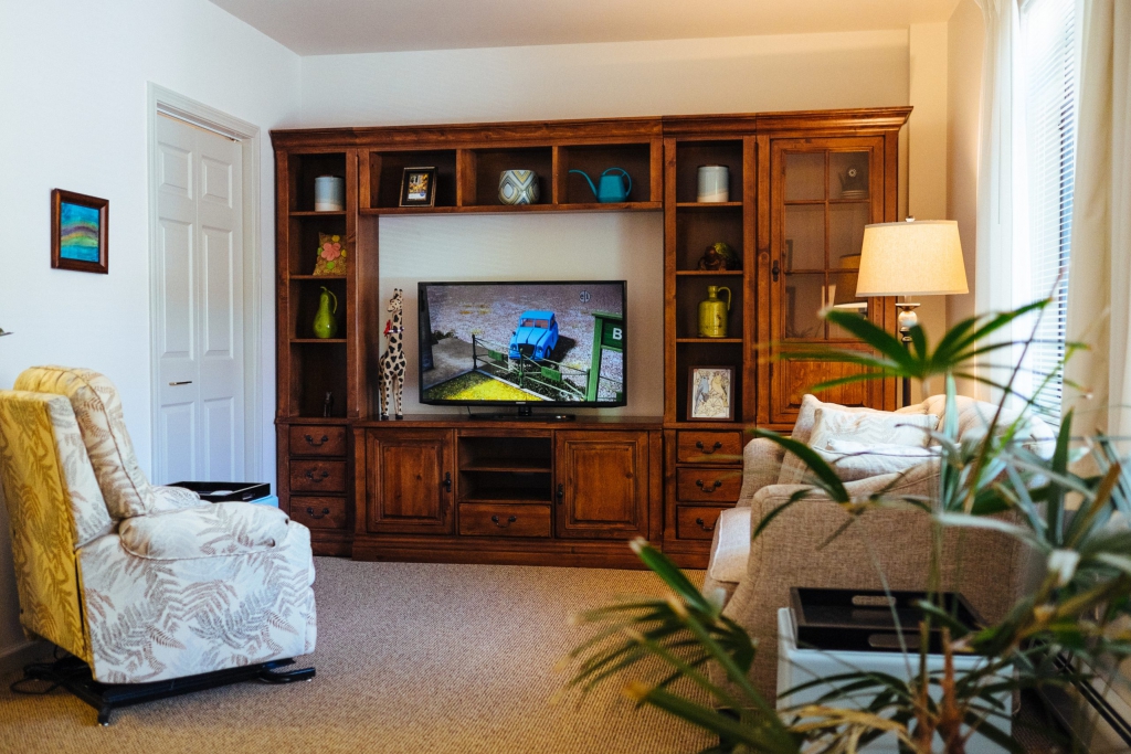 Cozy common area with seating and a television