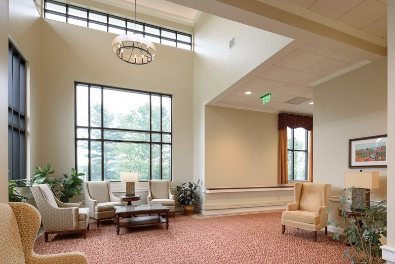 Well-lit lounge area with comfortable seating