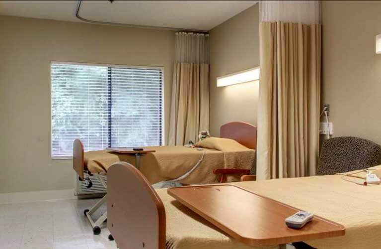 Interior view of a shared resident room with two beds