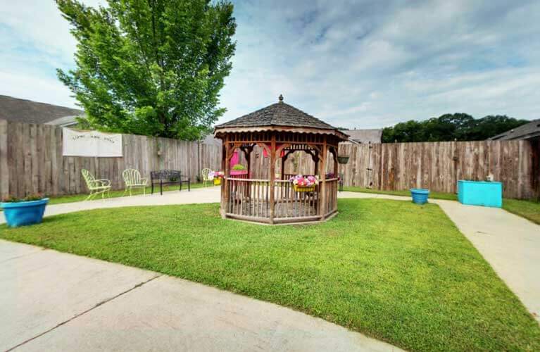 Outdoor gazebo in a landscaped area