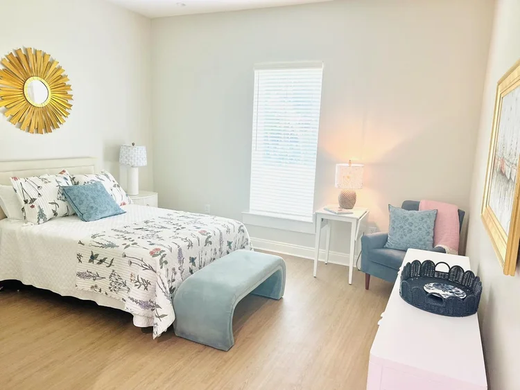Cozy interior of a private resident room with a bed and decor