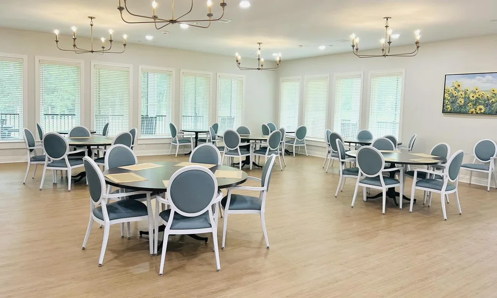 Bright dining area with circular tables and chairs