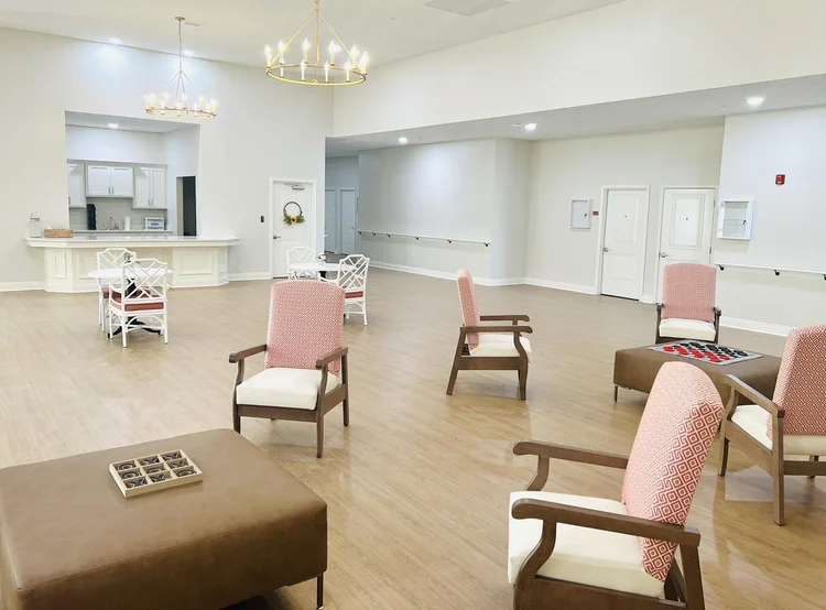 Bright common area with chairs and modern decor