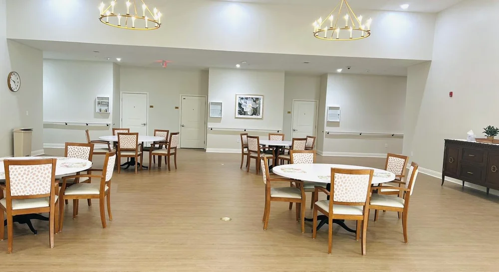 Bright dining room with tables and chairs
