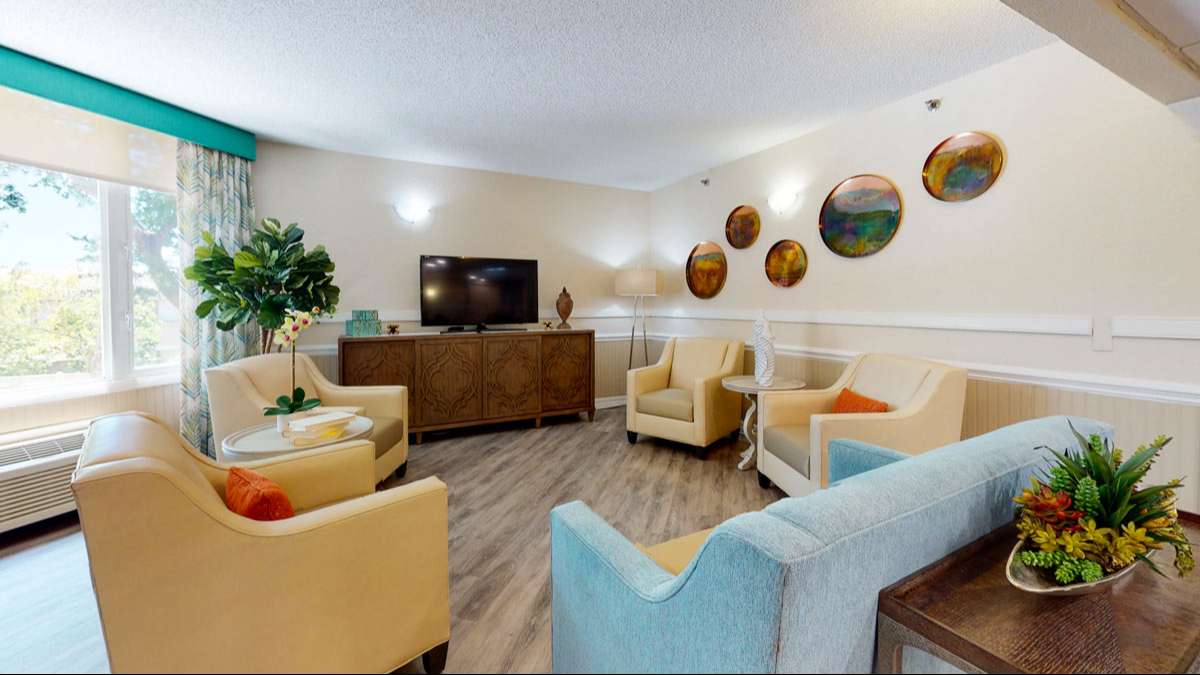Bright common area with seating and decor