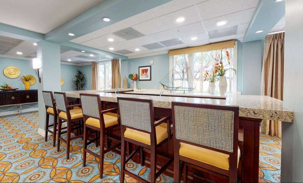 Bright common area with seating and natural light
