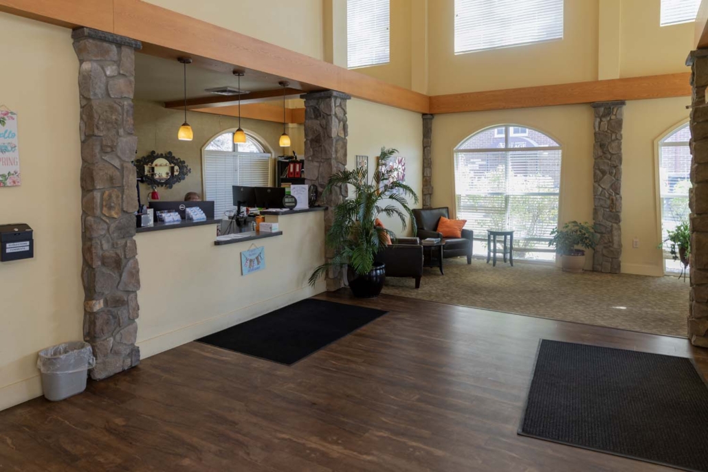 Bright lobby area with stone accents and seating