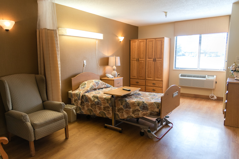 Cozy private room with bed and seating