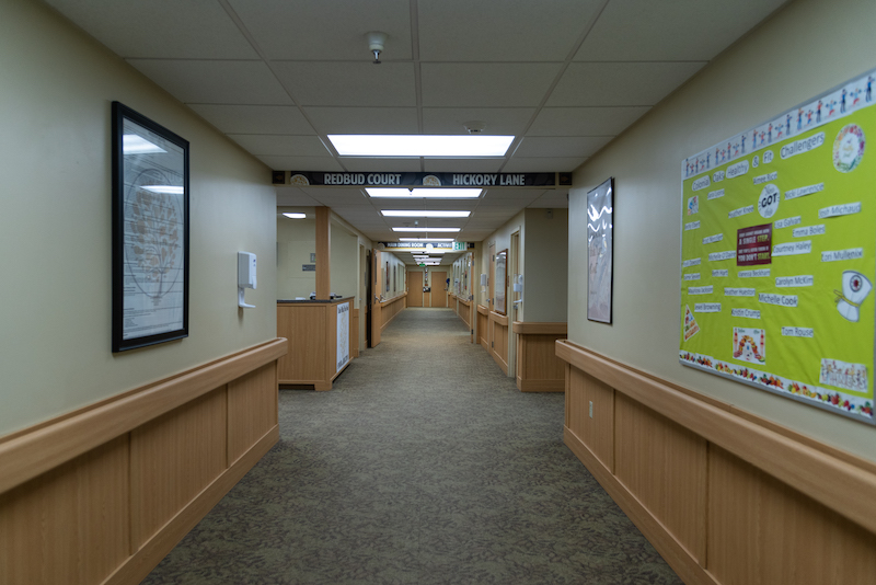 A hallway in Colonial Oaks Health Care Center