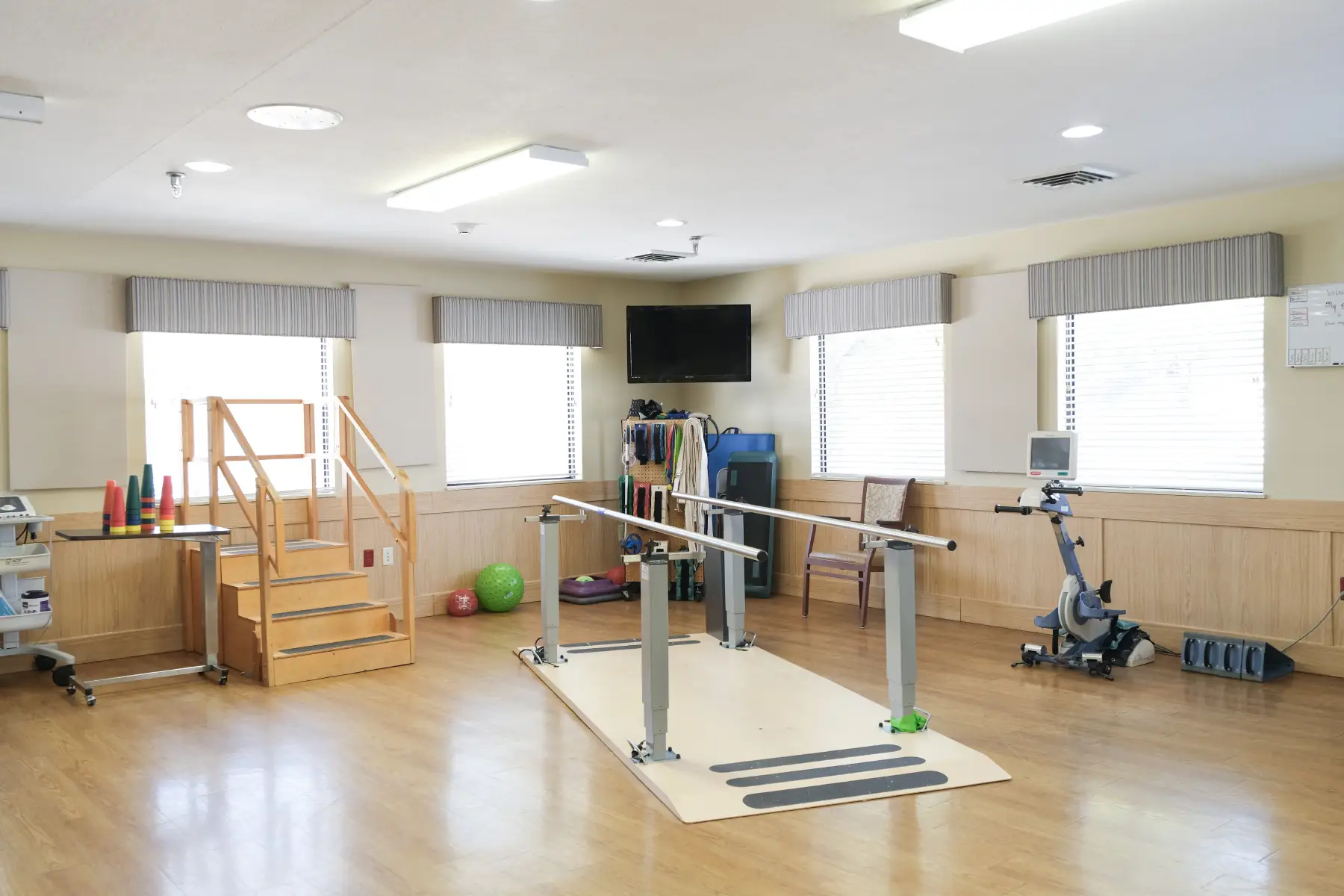 Interior view of a rehabilitation space with equipment
