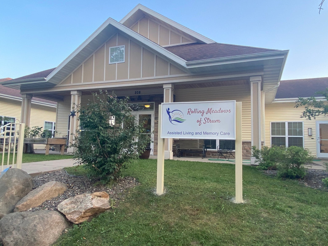 Front view of Rolling Meadows of Strum assisted living facility