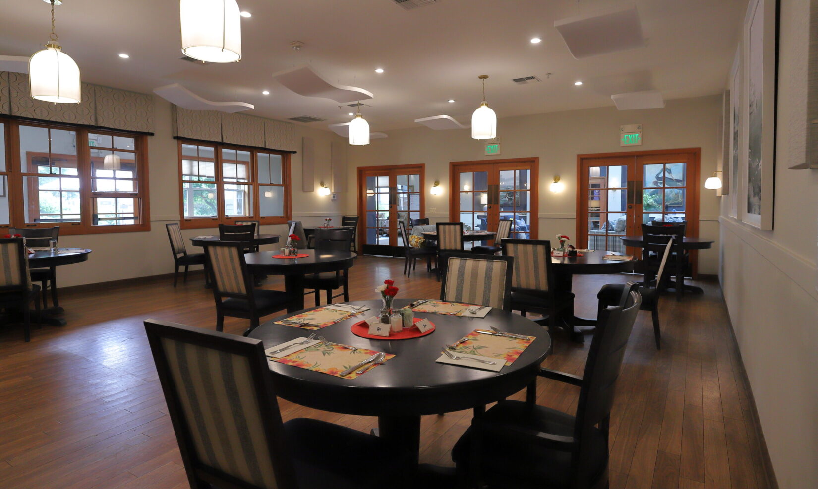 Bright dining room with tables set for a meal