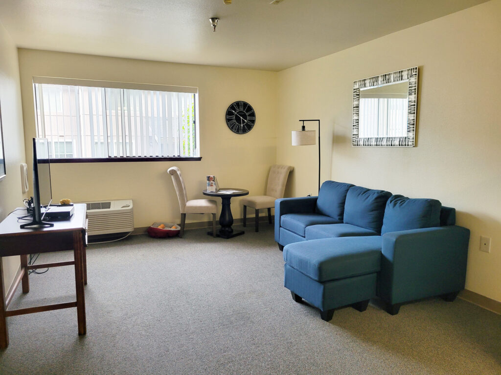 Cozy interior living space with couch and table