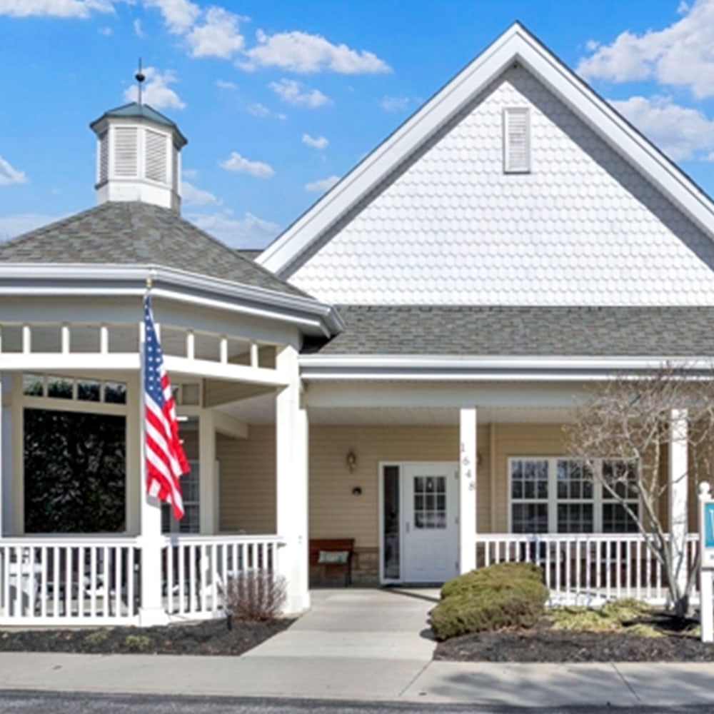 Exterior view of the facility with American flag
