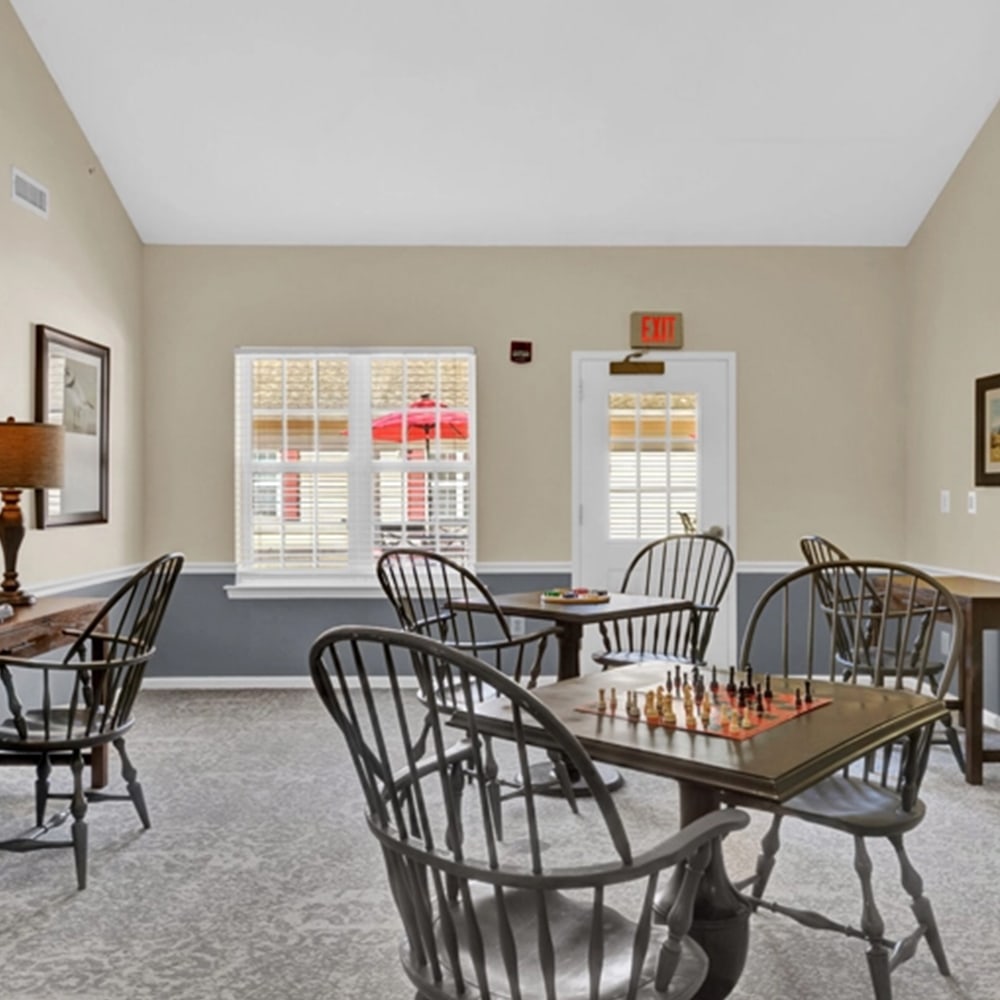 Common area with chess game and seating