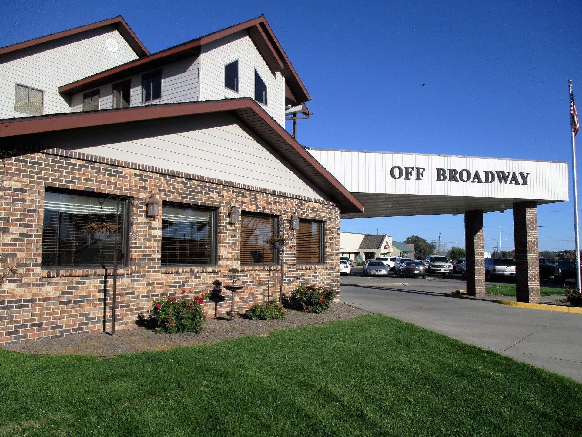 The building exterior of Off Broadway Apartments