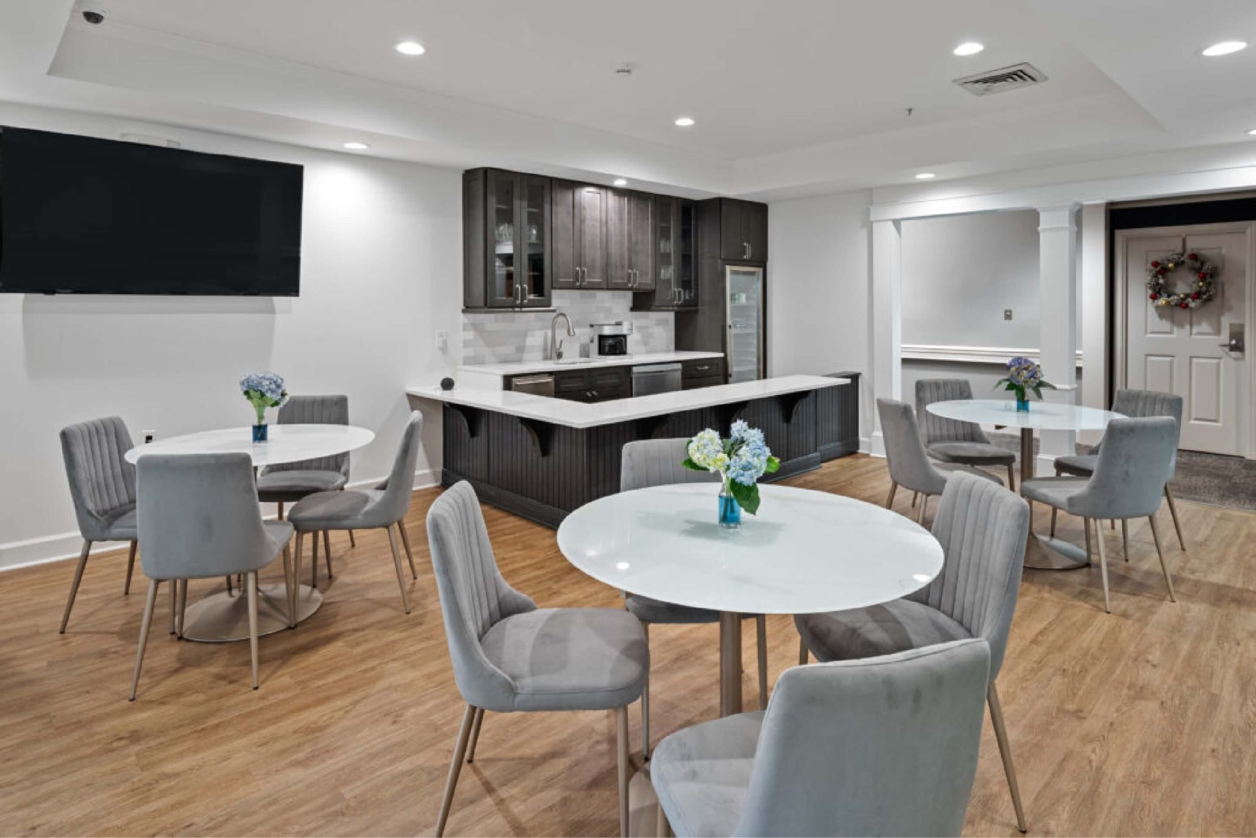 Bright dining area with tables and chairs