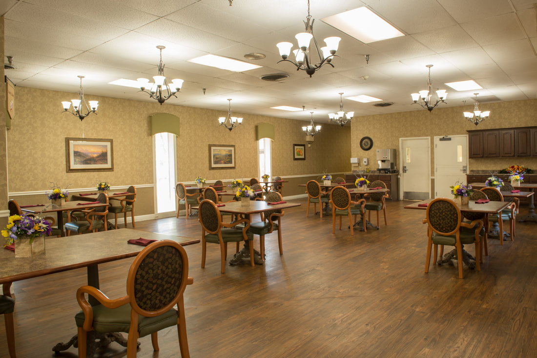 Dining area with tables and flowers