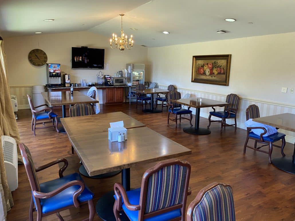 Interior dining room with tables and chairs