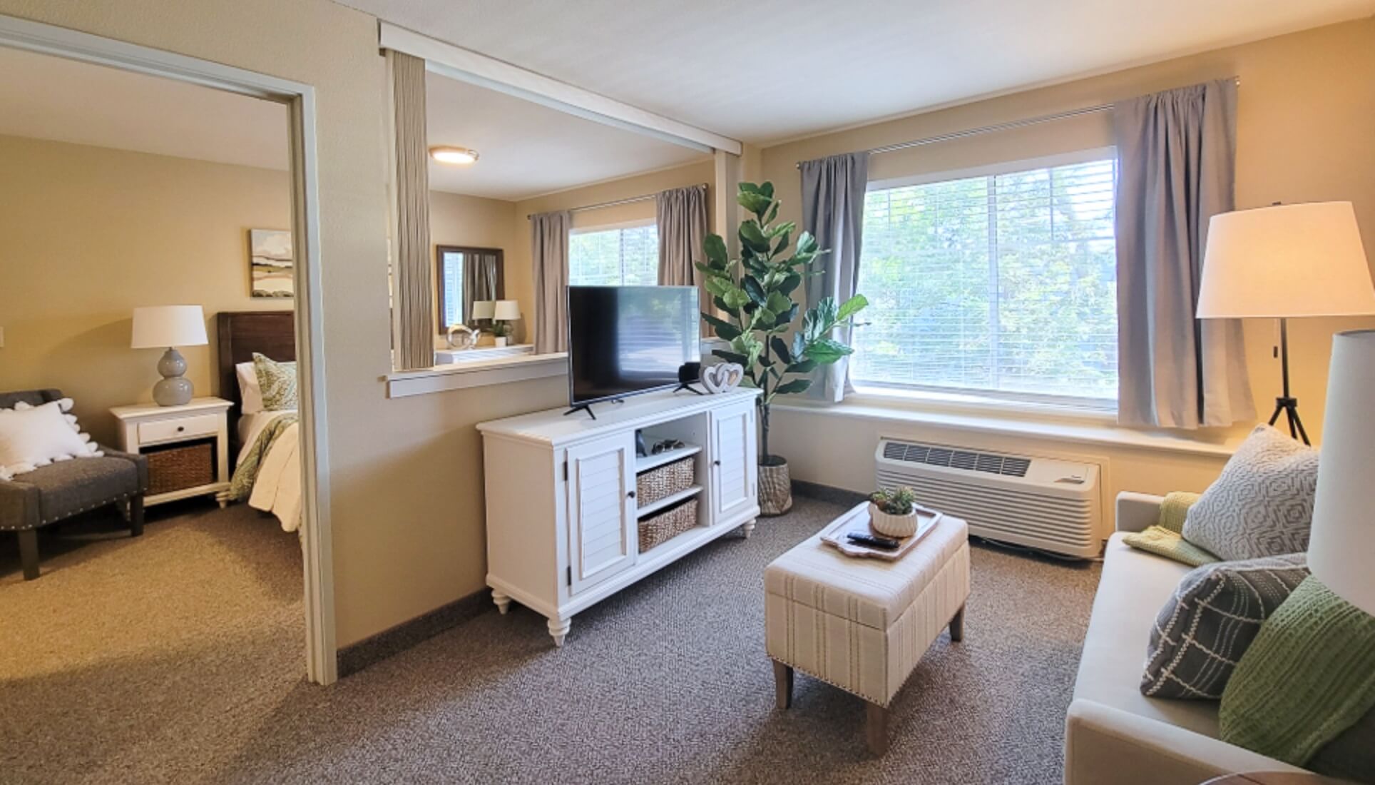 Cozy interior of a resident's room with a small living area