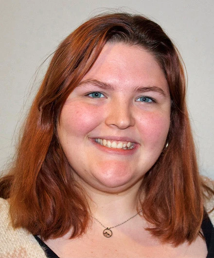 Close-up portrait of a smiling young woman