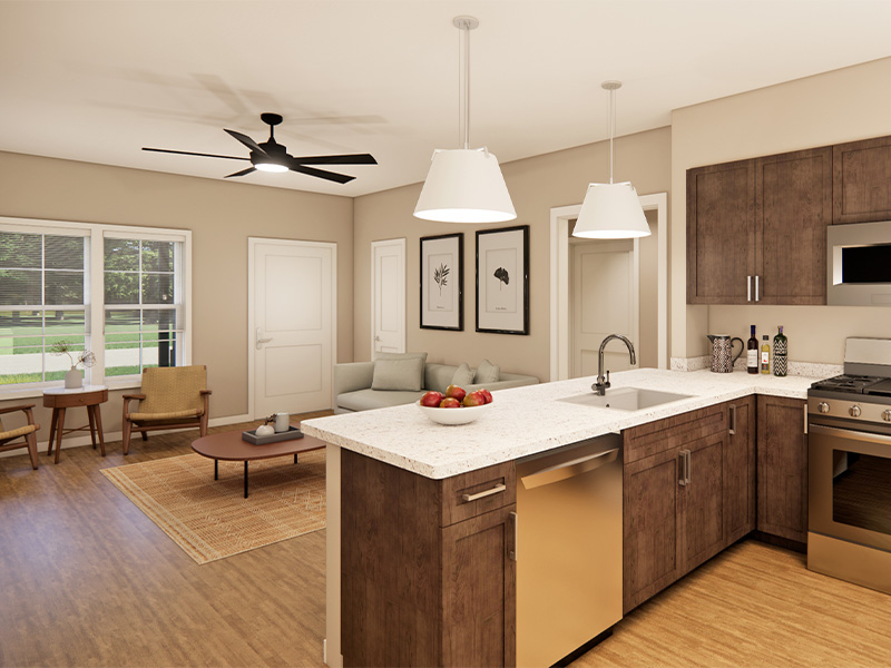 Modern kitchen and living area in a senior living residence